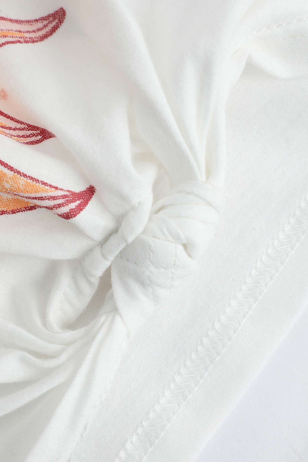 Camiseta Estampada Floral Con Borde Nudo Manga Corta